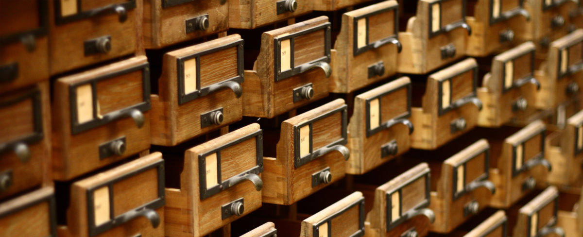 empty card catalog with drawers slightly open